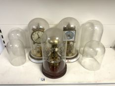 THREE DOME CLOCKS WITH FOUR SPARE DOMES