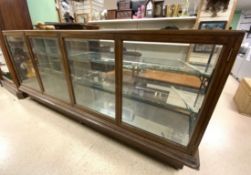 LARGE VICTORIAN SHOP DISPLAY DOUBLE GLASS COUNTER / CABINET WITH GLASS SHELVES ON CASTORS 244 X