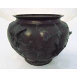 An oriental bronze jardinière, the lobbed sides with applied bird and branches, marks to the base,