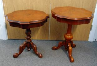 Two mahogany side tables inlaid with satinwood floral decorations, on three outswept legs, 66.5 x