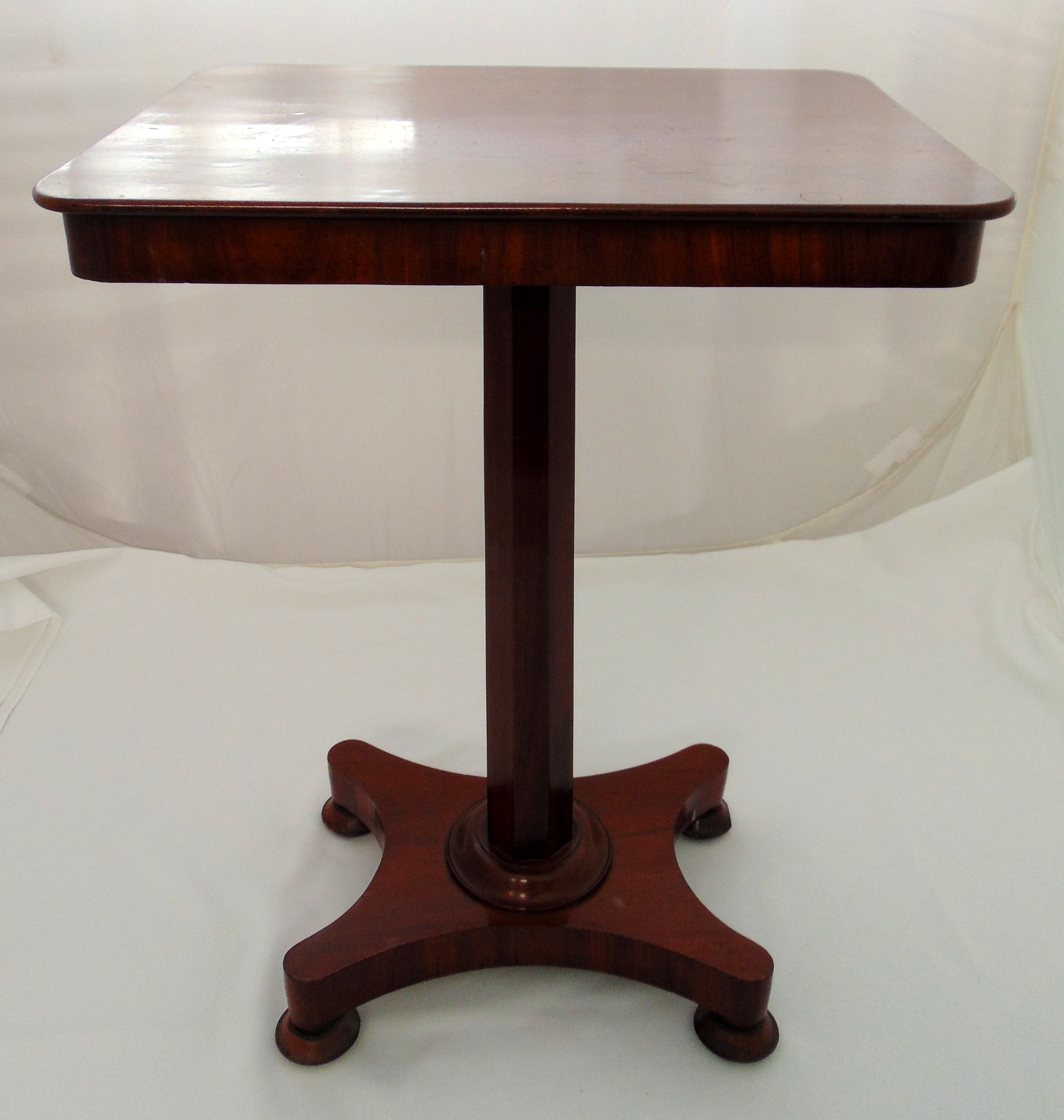 William IV rectangular mahogany side table on pedestal base with four ...