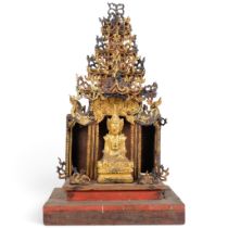 An Antique Burmese carved giltwood Buddha shrine, H60cm