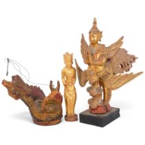A South East Asian carved giltwood winged figure, with mirror decoration, H36cm, and 2 other South
