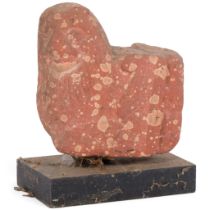An Ancient Indian relief carved red stone architectural fragment, mounted on wood plinth, H15cm