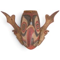 A Dayak (Borneo) carved and painted wood Hudoq mask, H24cm