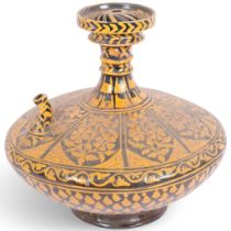 A large 19th century Continental slip glazed terracotta flask, H27cm