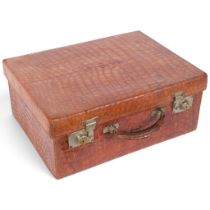 A late Victorian crocodile-skin suitcase, by Drew & Co, Leadenhall Street, London, small silver