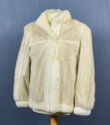 A White Mink Fur Coat, by Giddings Furs Harrow, clip frontage, leather panelling to underarms,