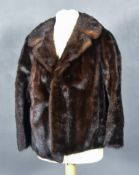 A Lady's Mink Short Fur Jacket, size 10, three fur hats, two fur stoles, and a brown suede and fur