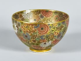 A Japanese Satsuma Circular bowl, Meiji Period, painted and decorated in gilt with flowers, 4.