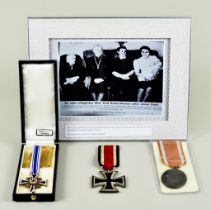 A Small Quantity of German Medals, comprising - a 1939 Iron Cross, Second Class, a German West