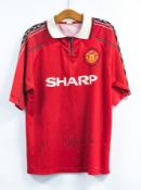 MANCHESTER UNITED FOOTBALL SHIRT, 2009 season, signed by Liverpool FC players, including Fernando