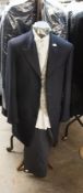 APPROX 30 BLUE TAILCOATS, SIZES 34-50, APPROX 30 BLUE PIN STRIPED TROUSERS, SIZES 32-50 AND APPROX