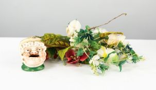 FOUR SMALL GARLANDS OF EARLY 20TH CENTURY DELICATE IMITATION FLOWERS produced using mainly stained