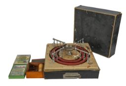 A French 'Jeu de Course' mechanical horse racing game, with two others