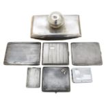A group of silver and plated card cases, vestas and desk blotter