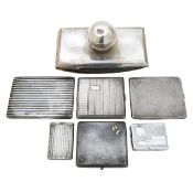 A group of silver and plated card cases, vestas and desk blotter