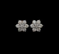A pair of diamond cluster earrings