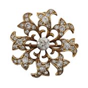 An Edwardian diamond flower head brooch pendant