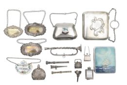 A group of silver novelty miniatures, purses, and card cases