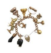 An impressive collection of fob seals and other charms bracelet