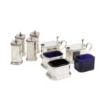 A George VI silver eight piece silver cruet set