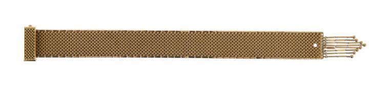 A stylish wide mesh bracelet with tassel detail