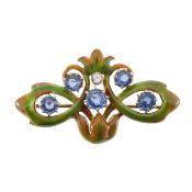 An Art Nouveau enamel, sapphire and diamond fleur de lis brooch/pendant