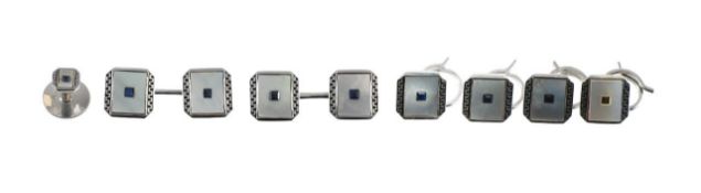 A set of 9ct white gold dress studs and cufflinks