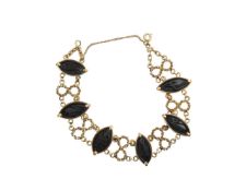 A fancy link panel bracelet