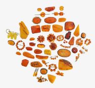 A large collection of amber brooches