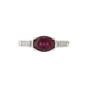 An 18ct diamond and pink tourmaline dress ring