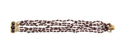 A six strand garnet bead bracelet