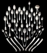 A collection of George III and later silver flatware