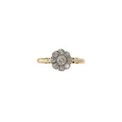 An Edwardian diamond set daisy sweetheart ring