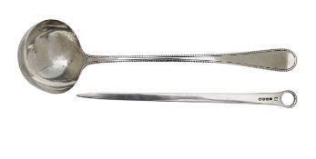 A George III silver meat skewer and a Victorian silver ladle