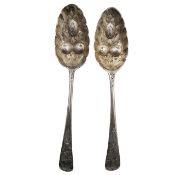 A pair of George III silver berry spoons