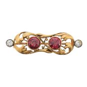 A Russian almandine garnet, diamond and yellow gold brooch