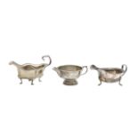 Two silver sauceboats, and a cream jug