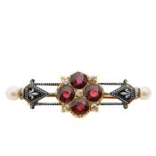 A Carlo Giuliano garnet, diamond, enamel and pearl brooch