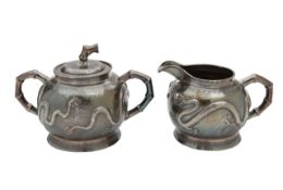 A Chinese export silver cream jug and sugar bowl