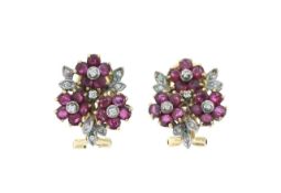 A pair of ruby and diamond cluster earrings
