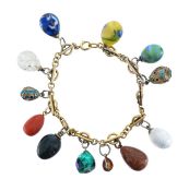 A bracelet with 12 charms some with Russian marks