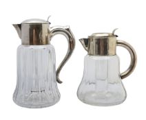 Two silver plated and cut glass lemonade jugs