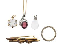 A Edwardian amethyst and seed pearl bar brooch, gold chain, three stone pendants and a stone set rin