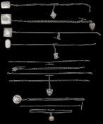 A collection of silver watch chains