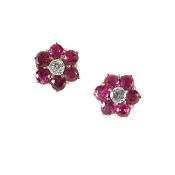 A pair of ruby and diamond cluster earrings