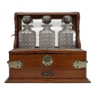 An oak and bras mounted tantalus