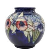A William Moorcroft pottery 'Orchid' pattern vase