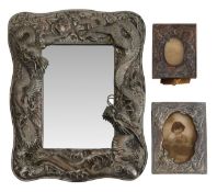 Two silver plated Chinese photograph frames and a mirror